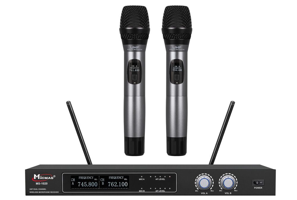 Set microfon wireless UHF, receptor plus doua microfoane de mana wireless.