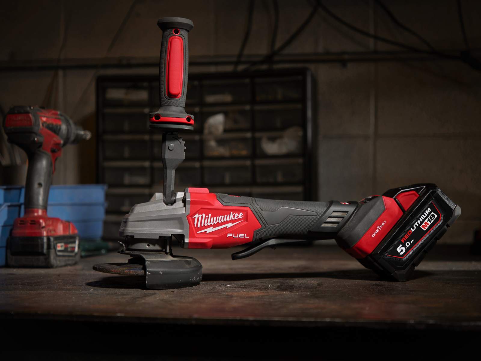 Polizor unghiular Milwaukee M18 FUEL ONE-KEY, 125mm, sistem FIXTEC, 2x acumulatori M18 5Ah, incarcator, cutie depozitare, 4933493553